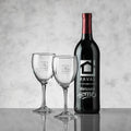 Custom engraved wine bottle with two personalized wine glasses