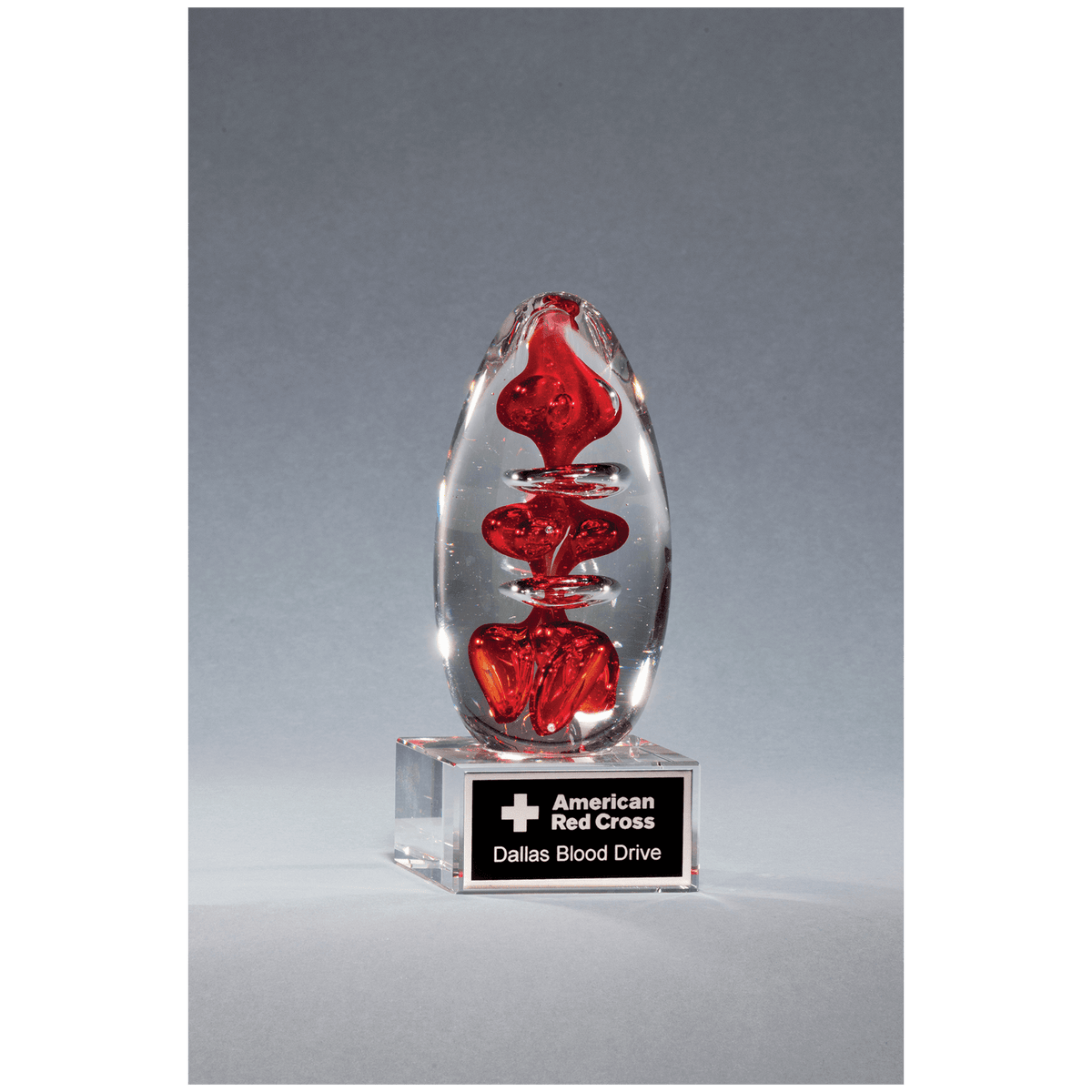 5 1/4" Red Egg Shaped Art Glass on Clear Glass Base with Black Laserable Aluminum Plate
